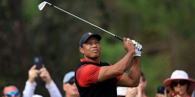 Tiger Woods plays his tee shot on the fourth hole during the final round of the 2022 PNC Championship at The Ritz-Carlton Golf Club on December 18, 2022 in Orlando, Florida. 