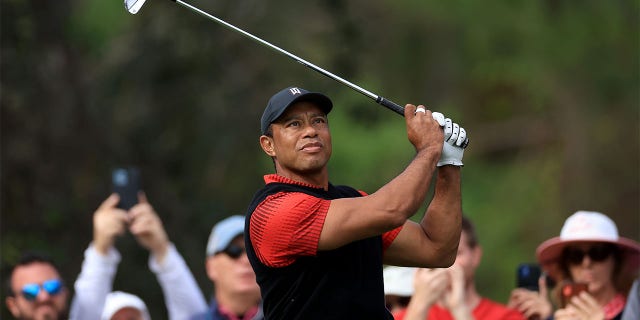 Tiger Woods plays his tee shot on the fourth hole during the final round of the 2022 PNC Championship at The Ritz-Carlton Golf Club on December 18, 2022 in Orlando, Florida. 