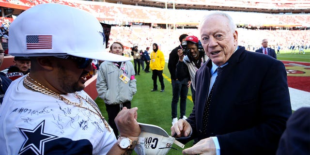 Dallas Cowboys owner Jerry Jones signs autographs prior to a game against the San Francisco 49ers in an NFC divisional playoff game at Levi's Stadium Jan. 22, 2023, in Santa Clara, Calif. 