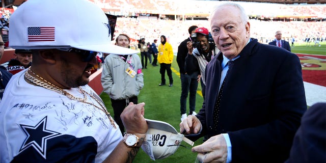 Dallas Cowboys owner Jerry Jones signs autographs prior to a game against the San Francisco 49ers in an NFC divisional playoff game at Levi's Stadium Jan. 22, 2023, in Santa Clara, Calif.