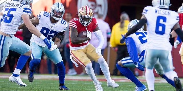 Deebo Samuel (19) of the San Francisco 49ers runs after making a reception during an NFC divisional playoff game against the Dallas Cowboys at Levi's Stadium Jan. 22, 2023, in Santa Clara, Calif. The 49ers defeated the Cowboys 19-12. 