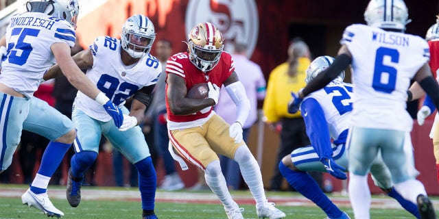 Deebo Samuel (19) of the San Francisco 49ers runs after making a reception during an NFC divisional playoff game against the Dallas Cowboys at Levi's Stadium Jan. 22, 2023, in Santa Clara, Calif. The 49ers defeated the Cowboys 19-12.