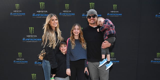 Christina Hall,  her children, Brayden, Taylor and Hudson, and her husband Josh Hall attend Monster Energy Supercross Celebrity Night at Angel Stadium of Anaheim on January 28, 2023.