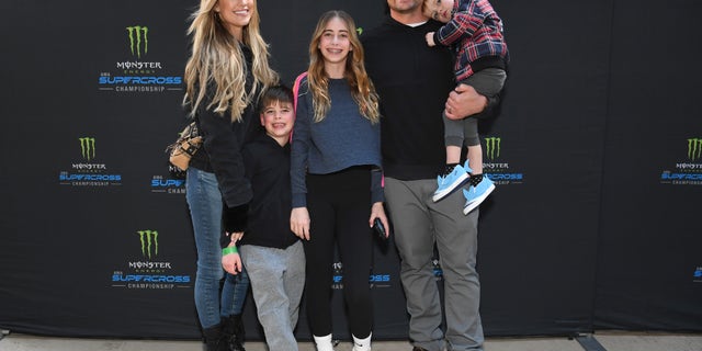 Christina Hall,  her children, Brayden, Taylor and Hudson, and her husband Josh Hall attend Monster Energy Supercross Celebrity Night at Angel Stadium of Anaheim on January 28, 2023.