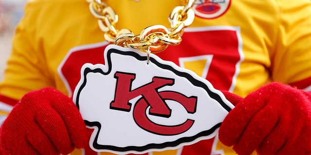 A detailed view of the Kansas City Chiefs logo on a fan prior to the AFC Championship Game against the Cincinnati Bengals at GEHA Field at Arrowhead Stadium on January 29, 2023, in Kansas City, Missouri. 
