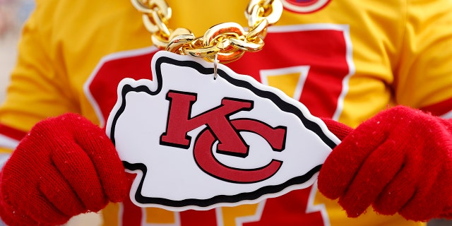 A detailed view of the Kansas City Chiefs logo on a fan prior to the AFC Championship Game against the Cincinnati Bengals at GEHA Field at Arrowhead Stadium on January 29, 2023, in Kansas City, Missouri. 