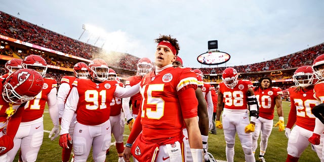 Patrick Mahomes (15) of the Kansas City Chiefs leads a huddle prior to the AFC championship game against the Cincinnati Bengals at GEHA Field at Arrowhead Stadium Jan. 29, 2023, in Kansas City, Mo. 