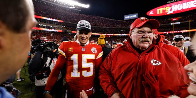 Patrick Mahomes (15) of the Kansas City Chiefs celebrates with head coach Andy Reid after defeating the Cincinnati Bengals in the AFC championship game at GEHA Field at Arrowhead Stadium Jan. 29, 2023, in Kansas City, Mo.