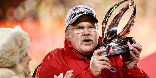 Kansas City Chiefs head coach Andy Reid celebrates with the Lamar Hunt trophy after winning the AFC Championship NFL Football Game between the Kansas City Chiefs and Cincinnati Bengals at GEHA Field at Arrowhead Stadium on January 29, 2023 in Kansas City, Missouri.