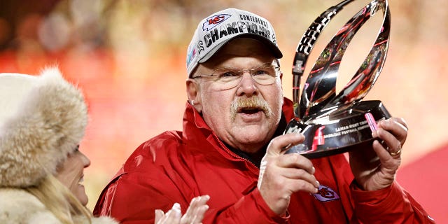 Kansas City Chiefs head coach Andy Reid celebrates with the Lamar Hunt Trophy after winning the AFC Championship NFL football game between the Kansas City Chiefs and the Cincinnati Bengals at GEHA Field at the Arrowhead Stadium on January 29, 2023 in Kansas City, Missouri.