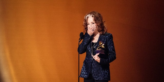 Bonnie Raitt accepts her surprise song of the year Grammy at the 2023 Grammy Awards.
