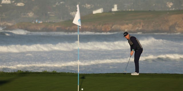 Justin Rose reacts to his putt on the 10th green during the Pebble Beach Pro-Am on Feb. 6, 2023.