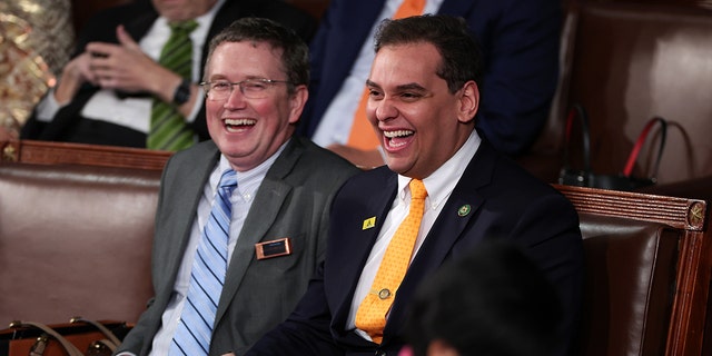 Rep. George Santos, R-NY, laughs alongside Rep. Thomas Massie, R-KY, prior to President Joe Biden's State of the Union on February 07, 2023, in Washington, DC.
