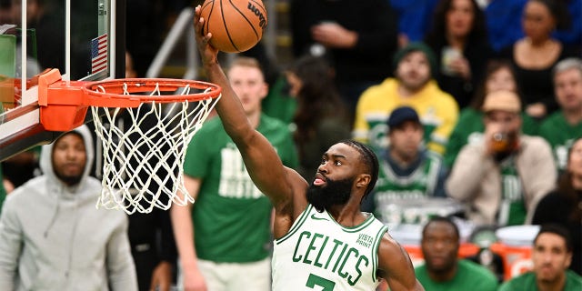 Jaylen Brown, #7 of the Boston Celtics, attempts a layup against the Philadelphia 76ers during the second quarter at the TD Garden on Feb. 8, 2023 in Boston.