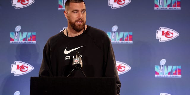 Travis Kelce, #87 of the Kansas City Chiefs, speaks to the media during the Kansas City Chiefs media availability prior to Super Bowl LVII at the Hyatt Regency Gainey Ranch on February 9, 2023, in Scottsdale, Arizona.