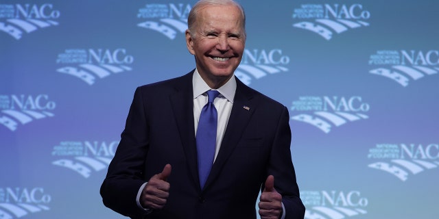 U.S. President Joe Biden gestures as he delivers remarks at the National Association of Counties legislative conference at the Washington Hilton Hotel on February 14, 2023, in Washington, DC. 