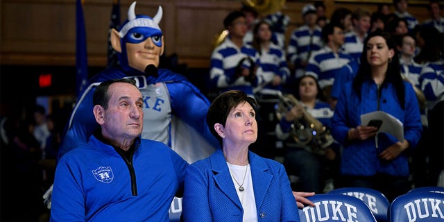 Mike Krzyzewski, former Duke Blue Devils head coach, and his wife Mickie watch the Notre Dame game at Cameron Indoor Stadium on February 14, 2023 in Durham, North Carolina.