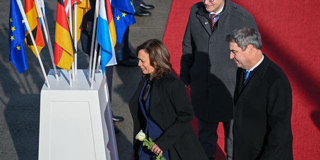 Vice President Kamala Harris is greeted by the prime minister of Bavaria, Markus Söder, as she arrives at Munich Airport on Feb. 16, 2023, in Freising, Germany.