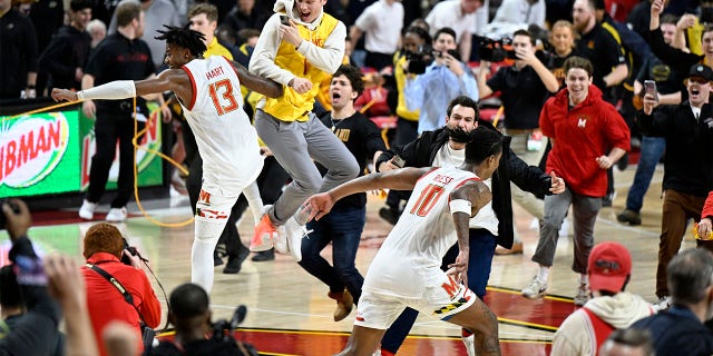 Hakim Hart and Julian Reese of the Maryland Terrapins after a 68-54 victory against the Purdue Boilermakers on Feb. 16, 2023, in College Park, Maryland.