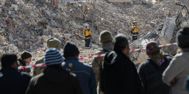Members of Colombian USAR team check the site of collapsed buildings on Feb. 17, 2023, in Hatay, Turkey. 
