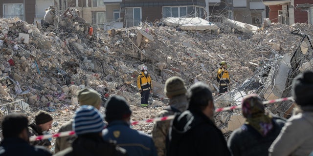 Members of Colombian USAR team check the site of collapsed buildings on Feb. 17, 2023, in Hatay, Turkey. 