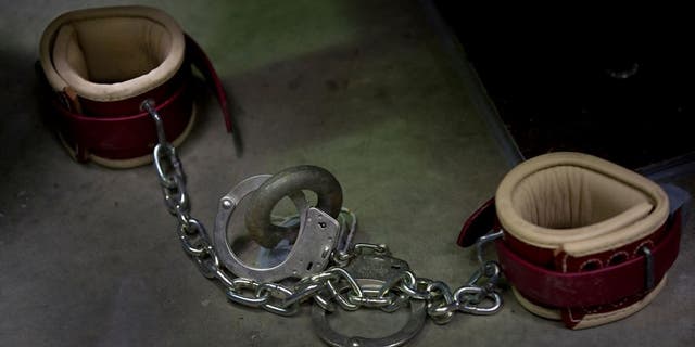In this photo reviewed by US military officials, a set of typical detainee restraints are seen at Camp VI at the US Detention Center in Guantánamo Bay, Cuba, March 30, 2010.