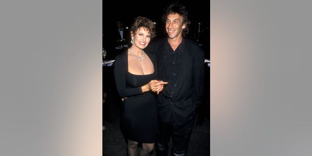 Raquel Welch and her third husband, Andre Weinfeld, in 1990.