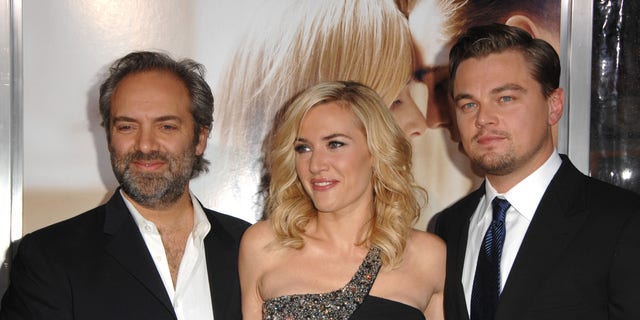 Kate Winslet said it was "a bit odd" filming the scenes with Leonardo DiCaprio in front of her then-husband, Sam Mendes. The trio is pictures here at the premiere of "Revolutionary Road" in 2008.