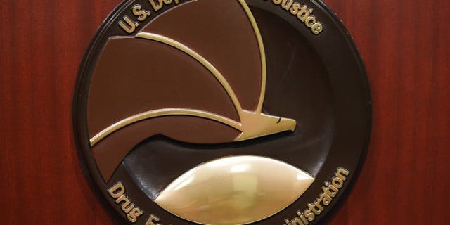 The seal of the Drug Enforcement Administration is seen on a lectern before the start of a press conference at DEA headquarters on June 26, 2013, in Arlington, Virginia.