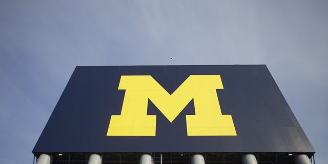 View of Michigan logo on wall before game vs Ohio State at Michigan Stadium.