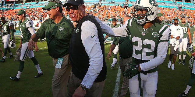 Head coach Rex Ryan of the New York Jets celebrates with players and coaches following a win against the Dolphins at Sun Life Stadium on Dec. 28, 2014, in Miami Gardens, Florida.