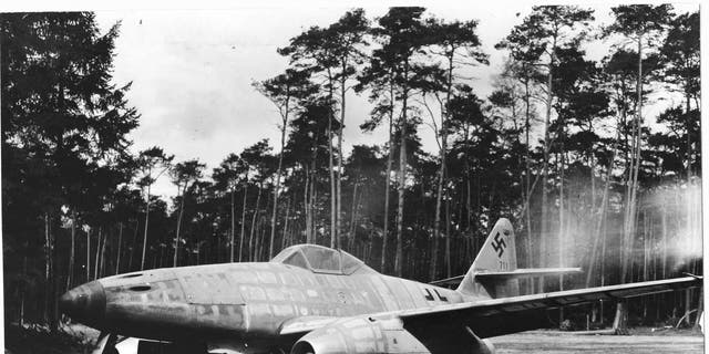 A German Messerschmitt 262A-1 jet-propelled fighter at the Rheinmain Airport, near Frankfurt, Germany, 1945. The Tuskegee Airmen shot down three ME-262s in their raid over Berlin in Mach 1945, despite its superior speed and dexterity. The first jet-propelled plane captured intact, it was flown over Allied lines and surrendered by its pilot who was supposed to be testing it at the time. 