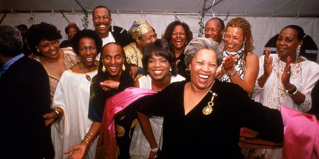 Nobel laureate Toni Morrison ((front, in black dress) acceps the applause of partygoers Susan Taylor, Rita Dove, Oprah Winfrey, Angela Davis, Maya Angelou and others in Winston-Salem, North Carolina.
