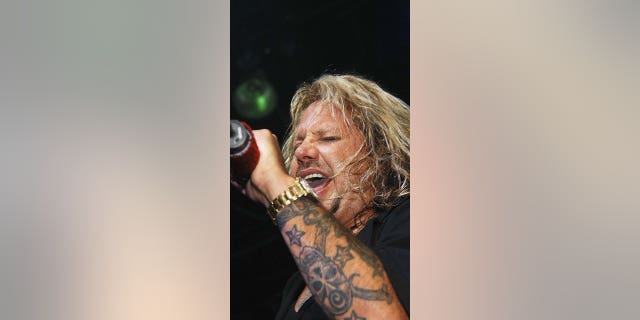 Vince Neil performs at Crobar June 7, 2004, in New York City.  