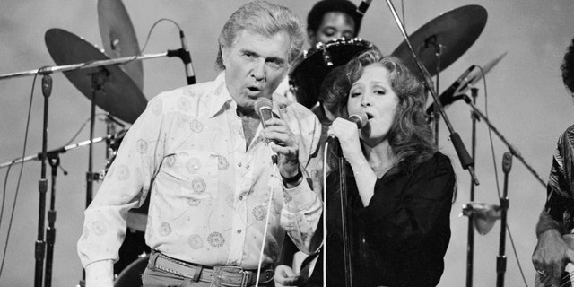 Bonnie Raitt with her father, John Raitt, in 1981.