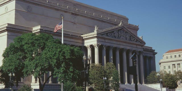 The National Archives building on Pennsylvania Avenue in Washington, D.C., 1973. It is the original headquarters of the National Archives and Records Administration.