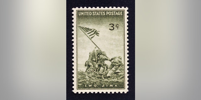 Postage stamp honoring the conquest of the Iwo Jima island, 1945, depicting Marines raising the flag of the United States (reproduction photo by Joe Rosenthal). United States of America, 20th century.