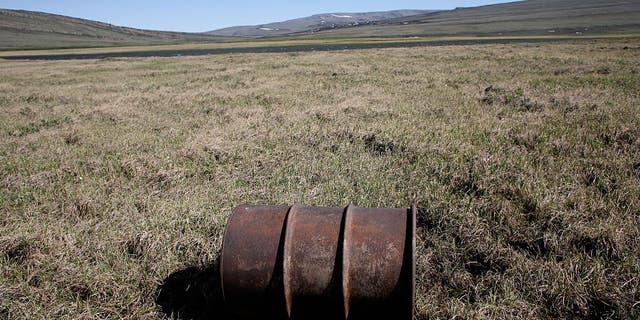A lone oil barrel is pictured near the Kokalik river which winds through the National Petroleum Reserve in northern Alaska. 
