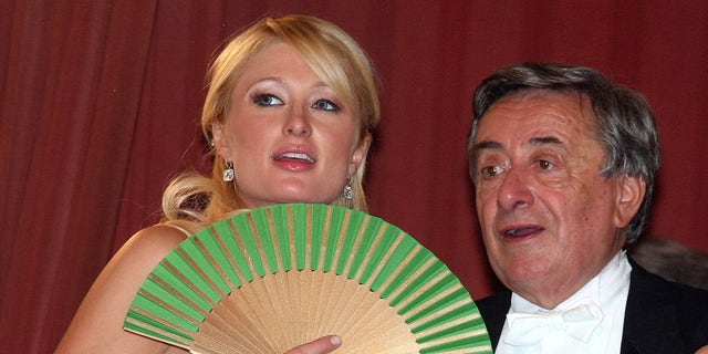 Paris Hilton and her host Richard Lugner chat during the Vienna Opera Ball in Vienna on Feb. 15, 2007.