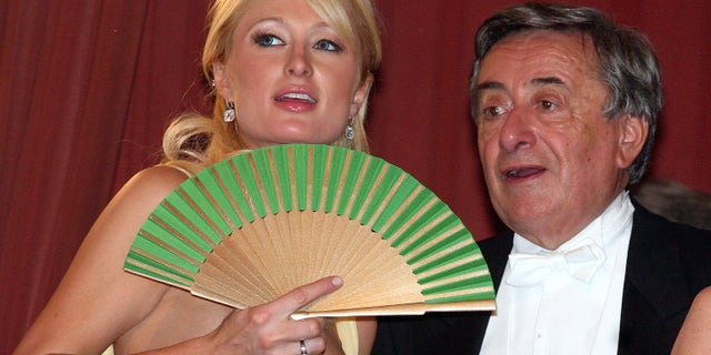 Paris Hilton and her host Richard Lugner chat during the Vienna Opera Ball in Vienna on Feb. 15, 2007.