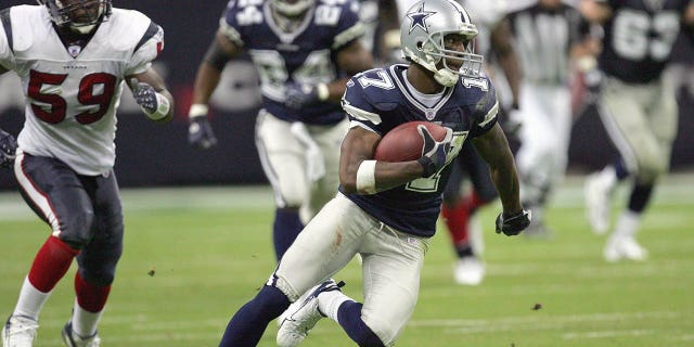 Sam Hurd of the Dallas Cowboys carries the ball during a game against the Houston Texans at Reliant Stadium in Houston, Texas, on Aug. 25, 2007.