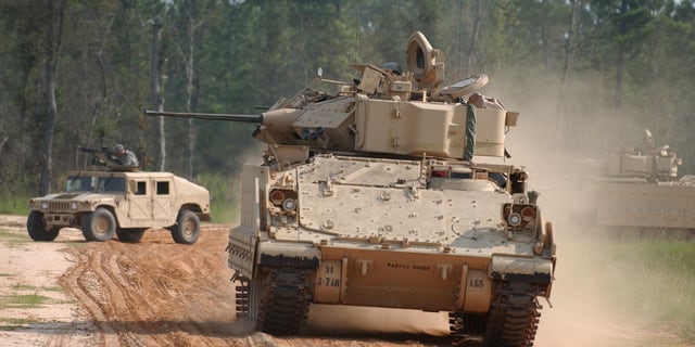 FILE PHOTO: Members of the U.S. Army's 3rd Infantry Division train during a live fire exercise in Fort Stewart, Georgia. 