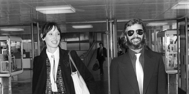 Former Beatles drummer Ringo Starr and Shelley Duvall at Heathrow Airport in London. 
