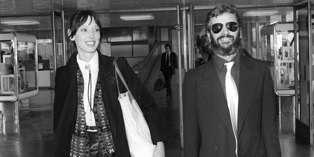 Former Beatles drummer Ringo Starr and Shelley Duvall at Heathrow Airport in London.
