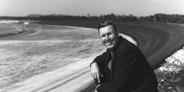 Bill France Sr. looks on from the track he created circa 1959 at the Daytona International Speedway in Daytona Beach, Florida.  