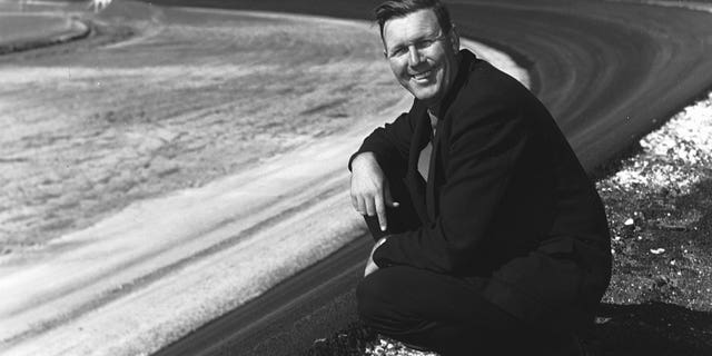 Bill France Sr. looks on from the track he created circa 1959 at the Daytona International Speedway in Daytona Beach, Florida.  