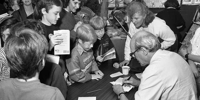 Roald Dahl autographs books in Dun Laoghaire shopping centre on October 22, 1988.