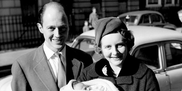 Colin Tennant and Lady Anne Glenconner outside the London nursing home with their first baby Charles.
