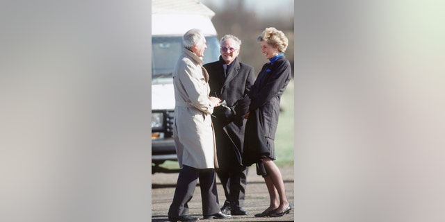 Dickie Arbiter, center, with Princess Diana, worked for the royal family between 1988 and 2000.