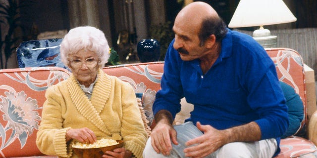 Estelle Getty, left, as Sophia Petrillo and Herb Edelman as Stan Zbornak. Joel Thurm claimed that in scenes where Getty's character was eating, she would have lines written on the palms of her hands.